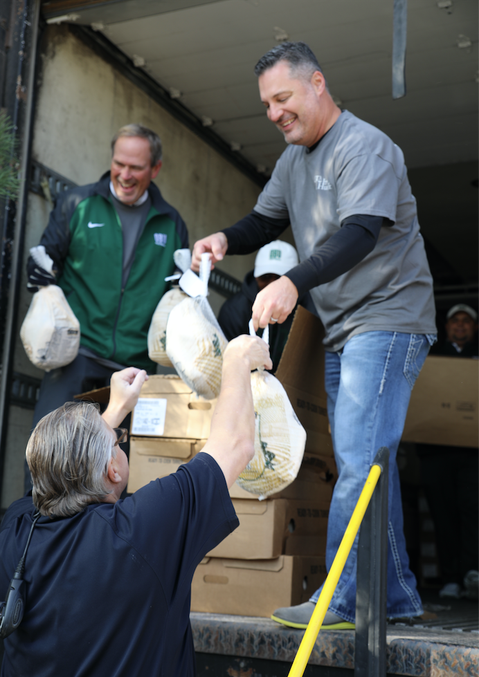 Noble McIntyre unloading turkeys at annual day of kindness