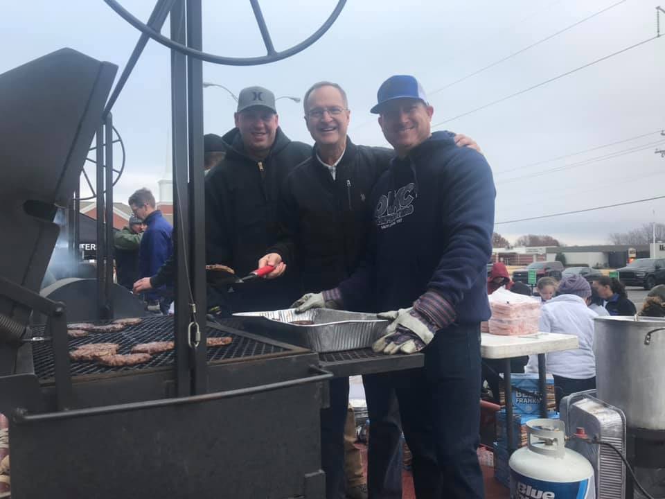 lon kruger making food at mcintyre law 2019 day of kindness