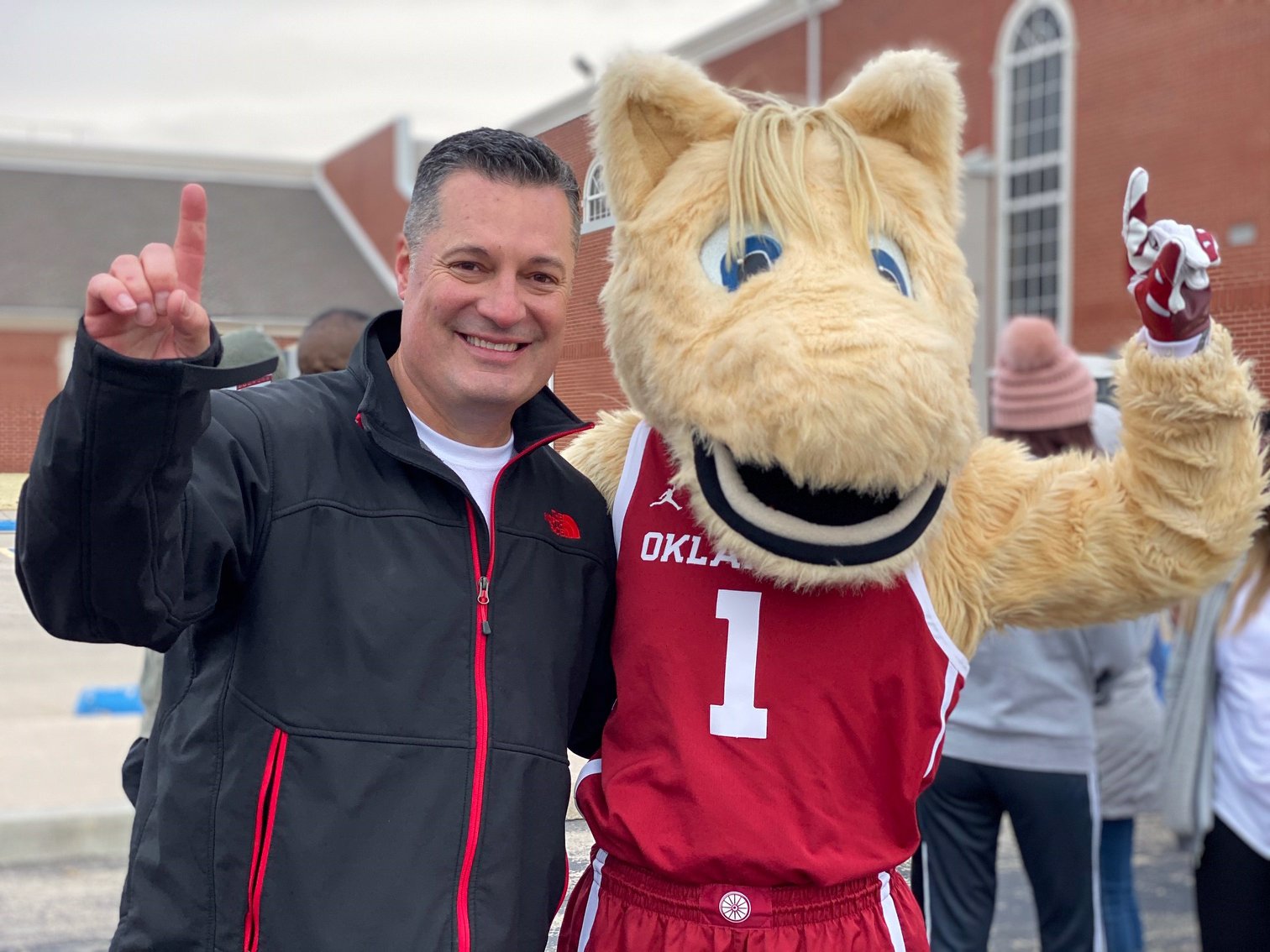 noble mcintyre with sooner mascot