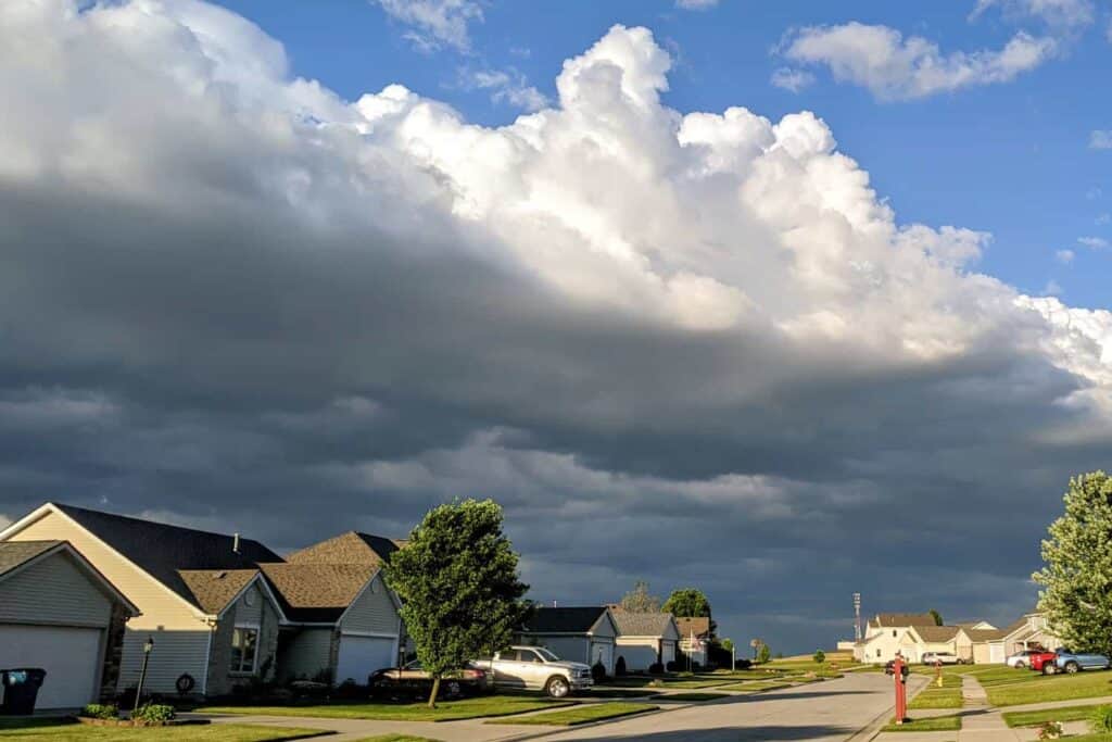 Photo of a spring storm in Oklahoma rolling in over a neighborhood.