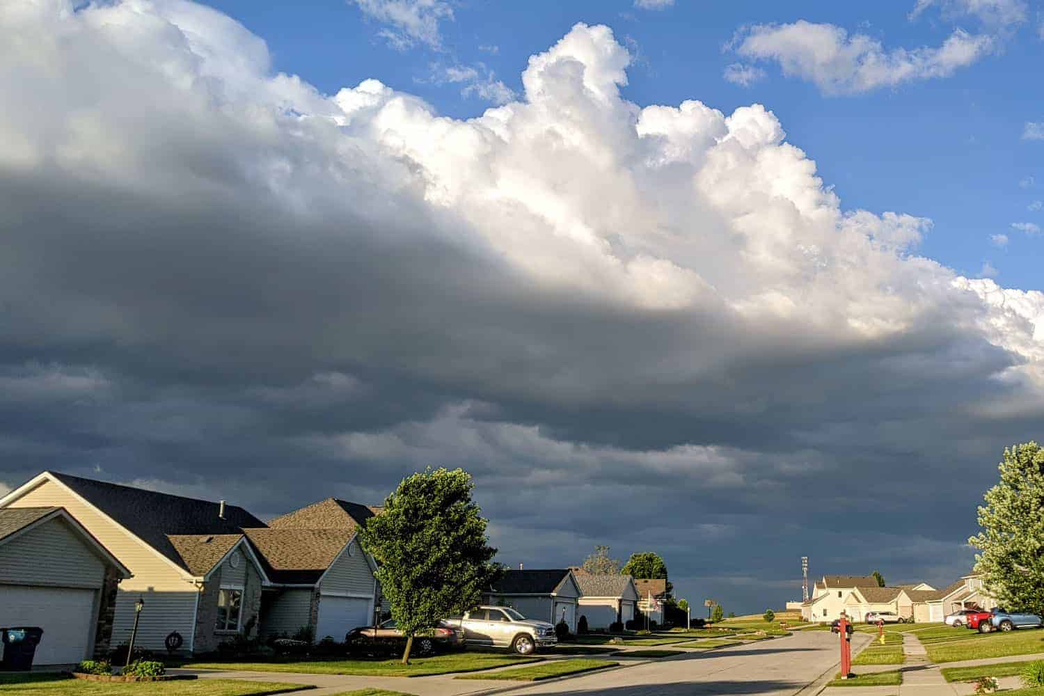 Photo of a spring storm in Oklahoma rolling in over a neighborhood.